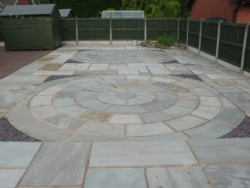 Stone circle patio landscaping